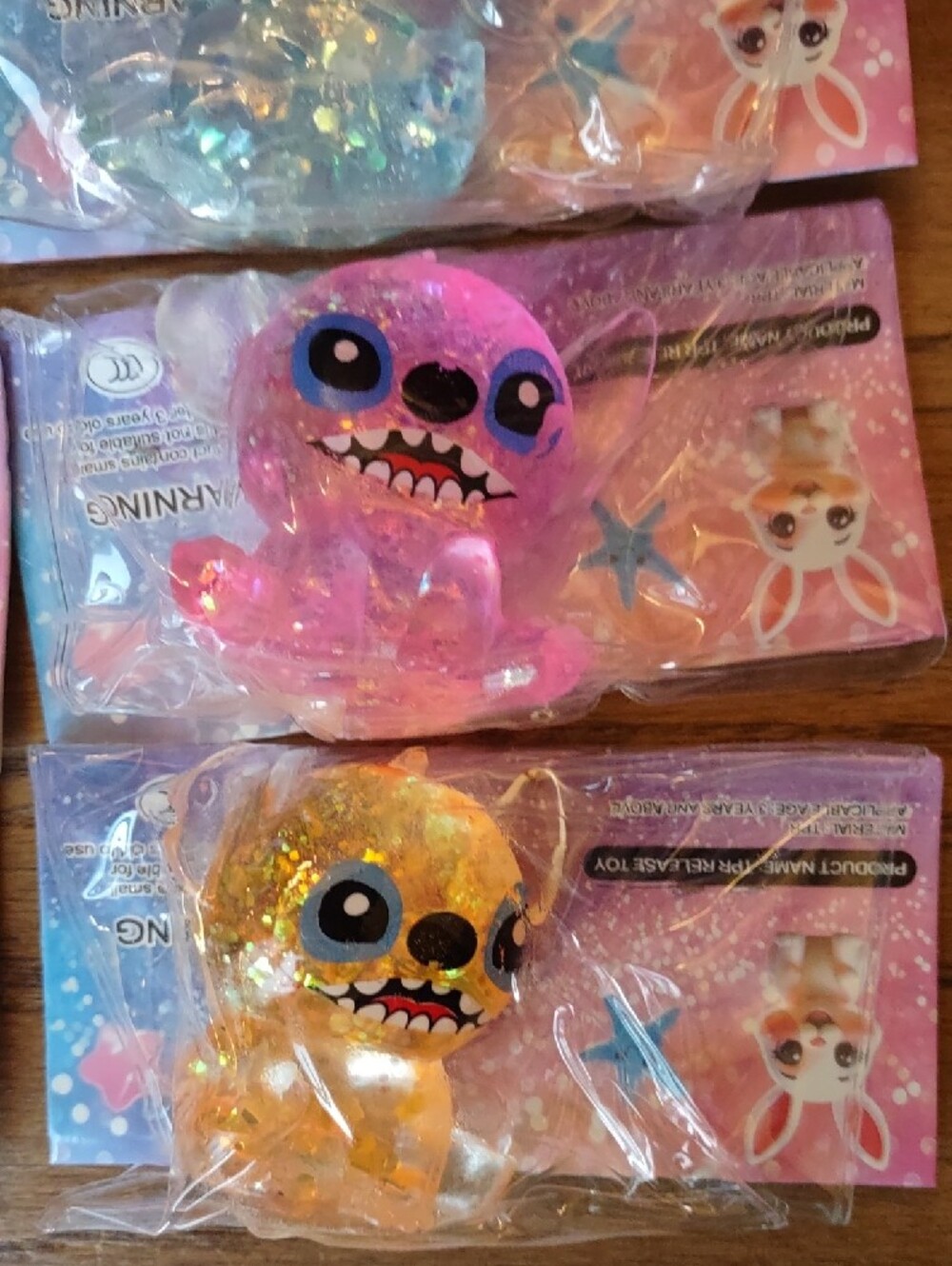 NEW Glitter Stitch Squishy Toy – Set of 8-Green, Blue, Pink & Orange - Picture 3 of 4